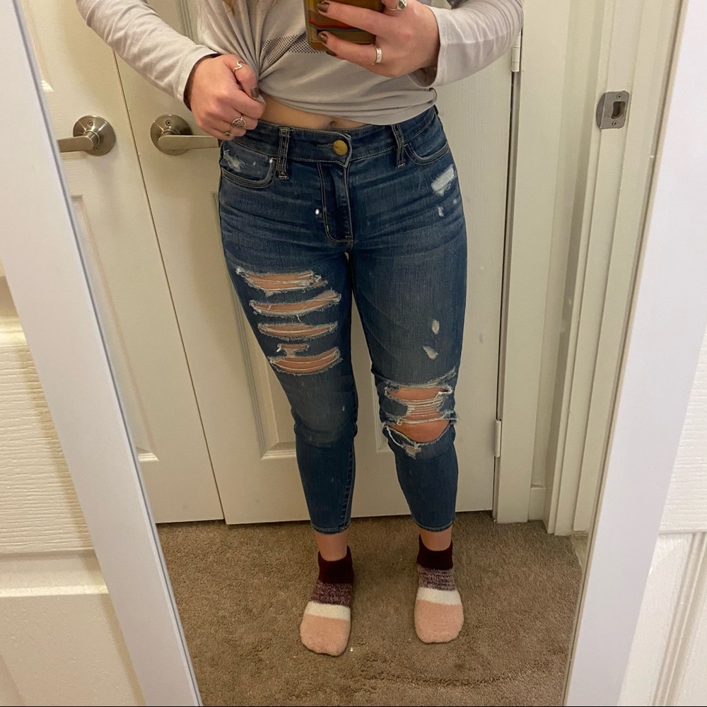 Medium wash distressed skinny jeans